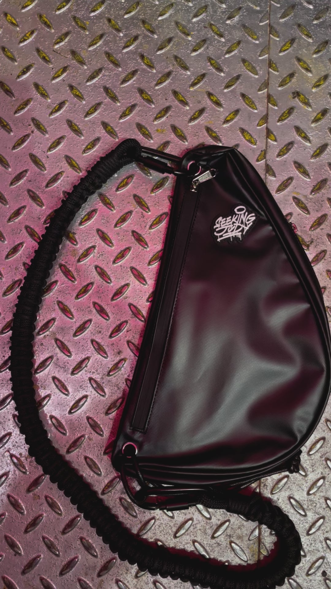 Black waterproof mini sling